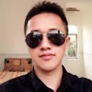 洲@